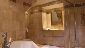 Suite | Bathroom | Rainfall showerhead, designer toiletries, hair dryer, bathrobes