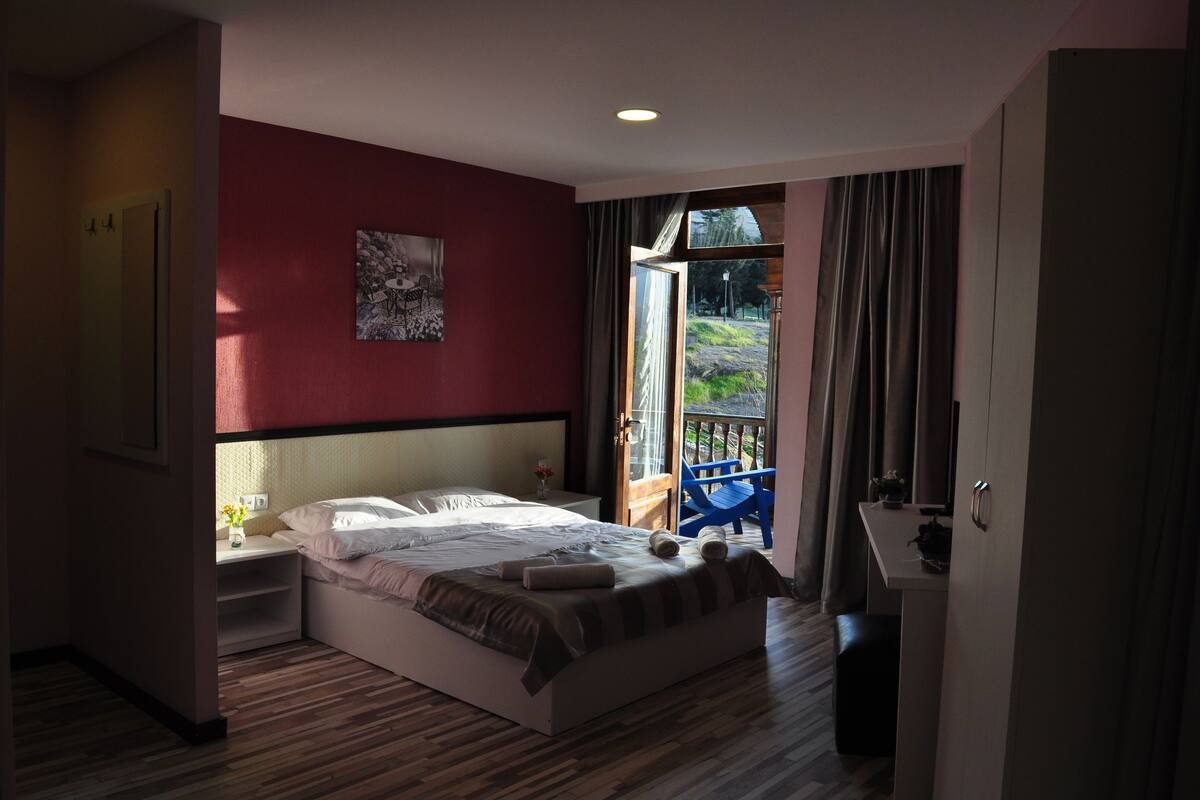 Standard Triple Room, Balcony, City View | Minibar, desk, soundproofing, iron/ironing board