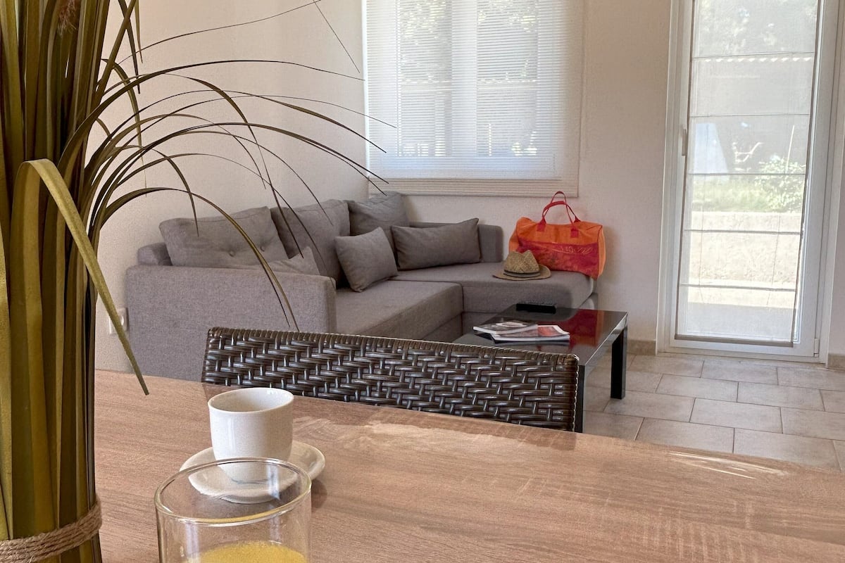 design house, 2 bedrooms | living area | flat-screen tv