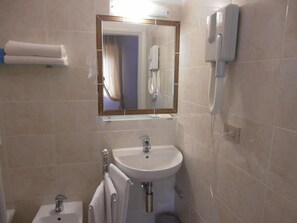 Shower, free toiletries, hair dryer