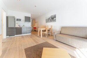 Comfort Apartment, 2 Bedrooms, Balcony, Mountain View | Living area | Smart TV, heated floors - Alpinresort Damüls (Damüls)