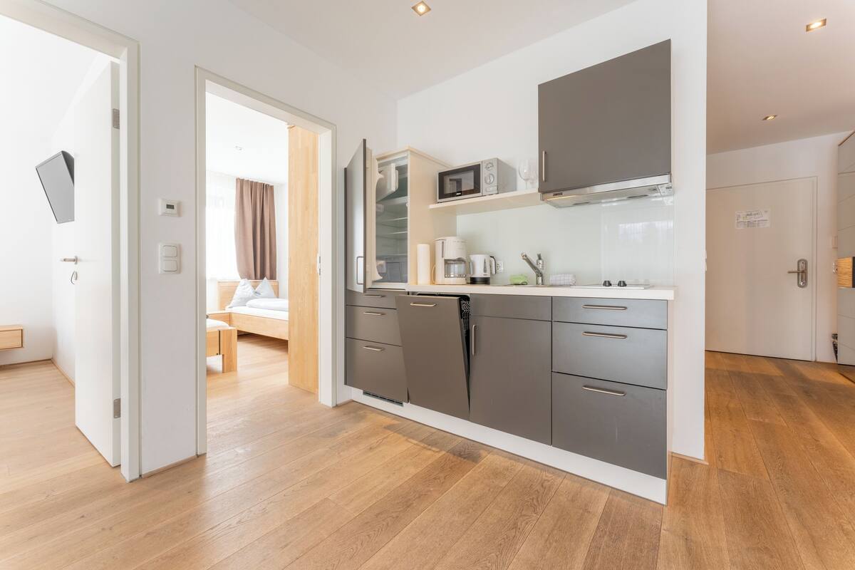 comfort apartment, 2 bedrooms, balcony, mountain view | in-room dining