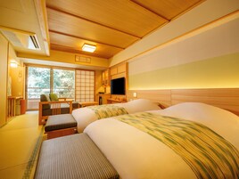 Quadruple Room | Down comforters, in-room safe, free WiFi