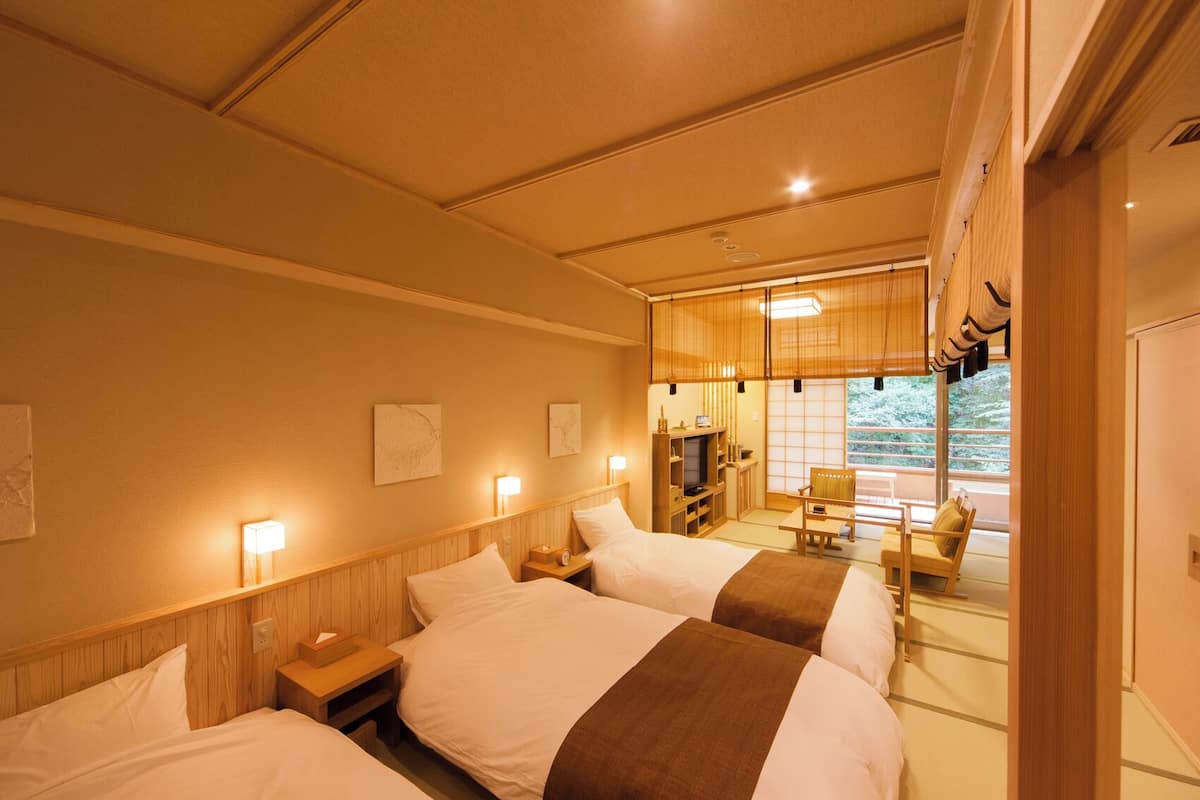 Triple Room | Down comforters, in-room safe, free WiFi