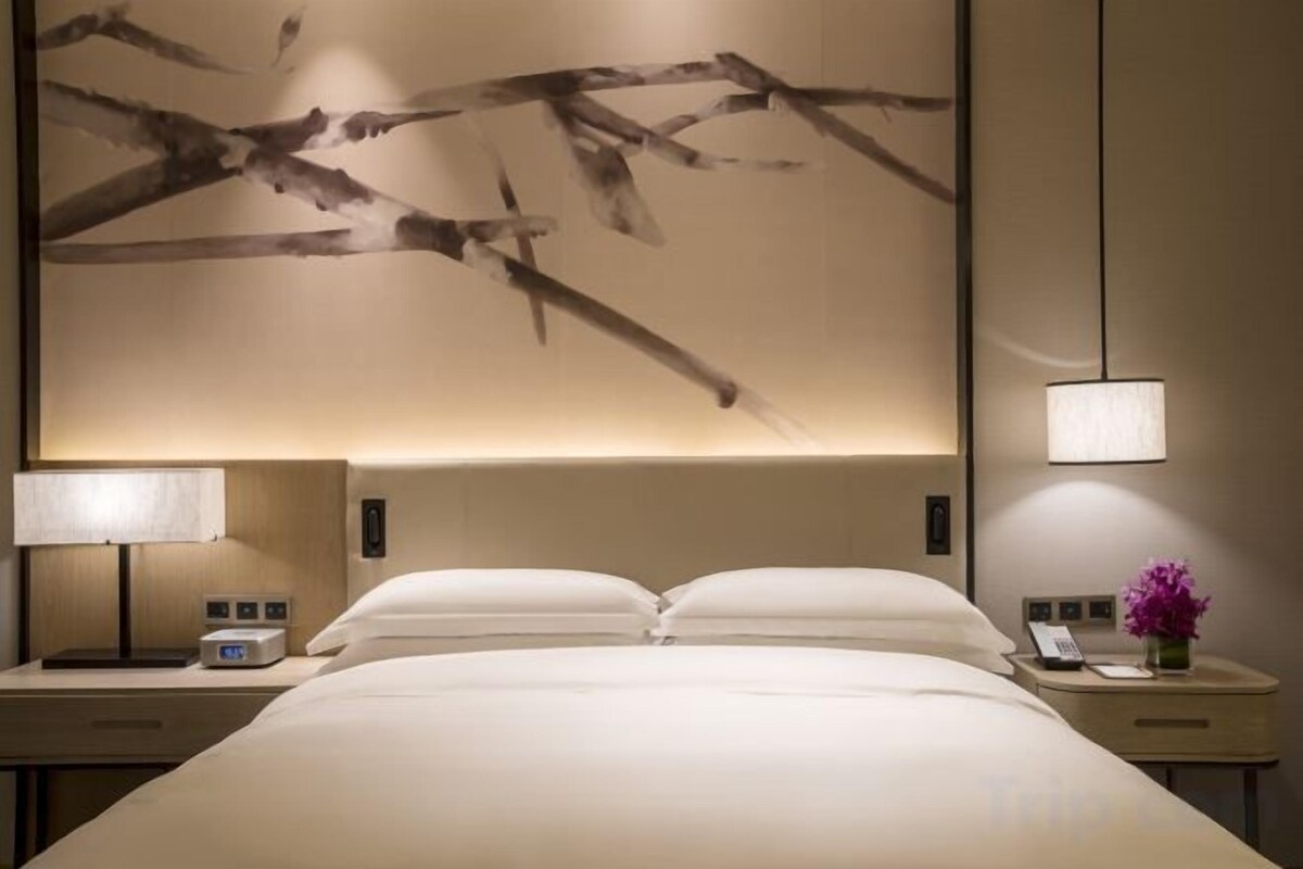 Premium bedding, down comforters, memory foam beds, minibar