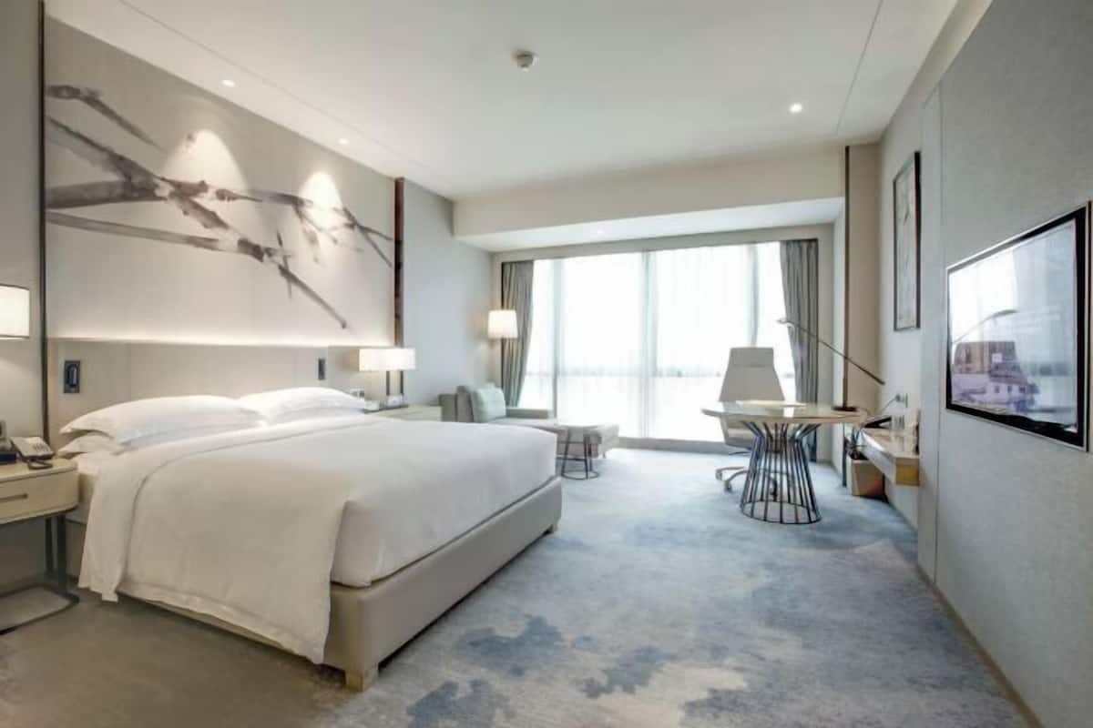 Premium bedding, down comforters, memory foam beds, minibar