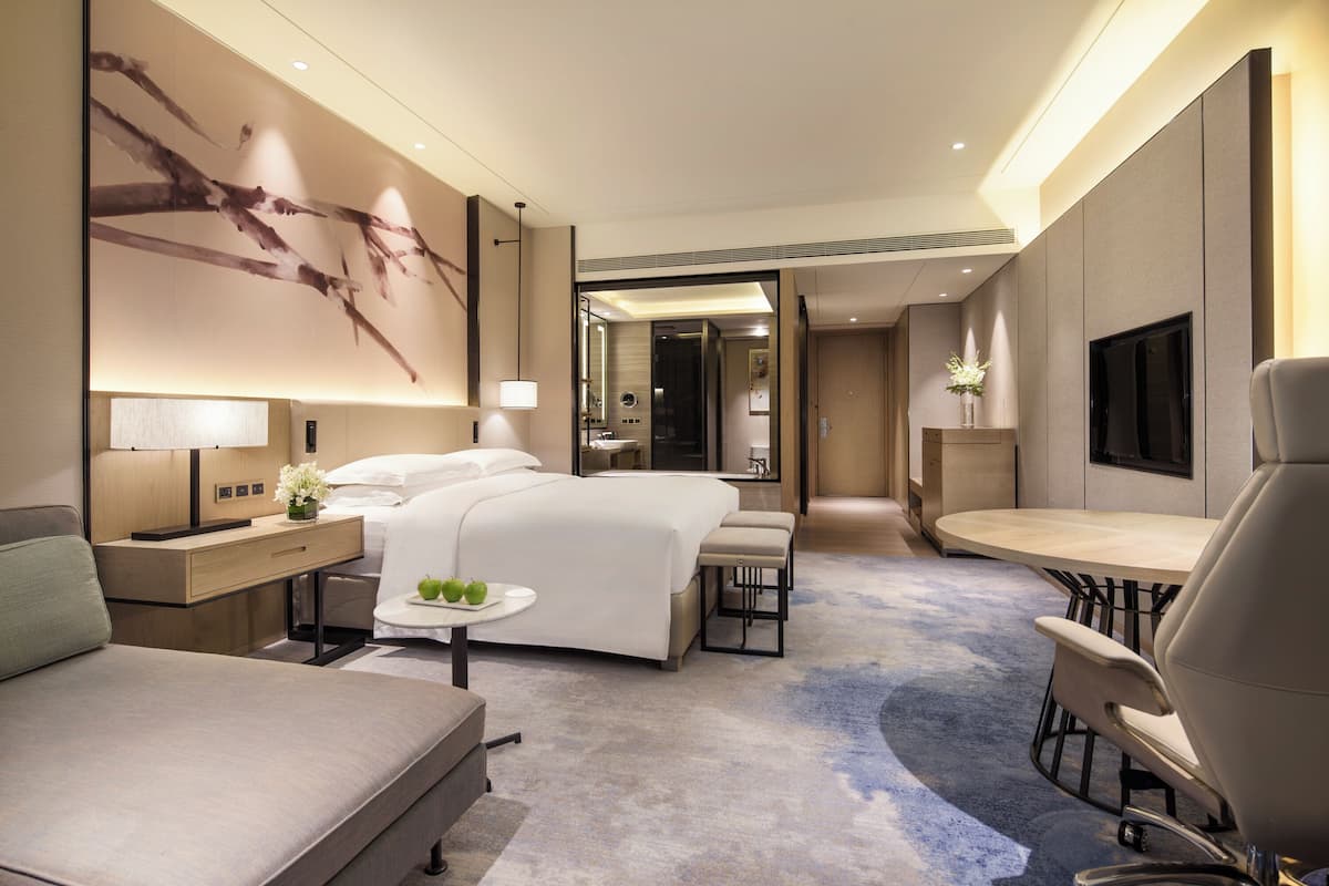 Premium bedding, down comforters, memory foam beds, minibar
