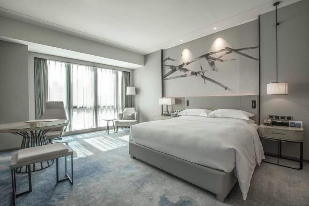 Premium bedding, down comforters, memory foam beds, minibar