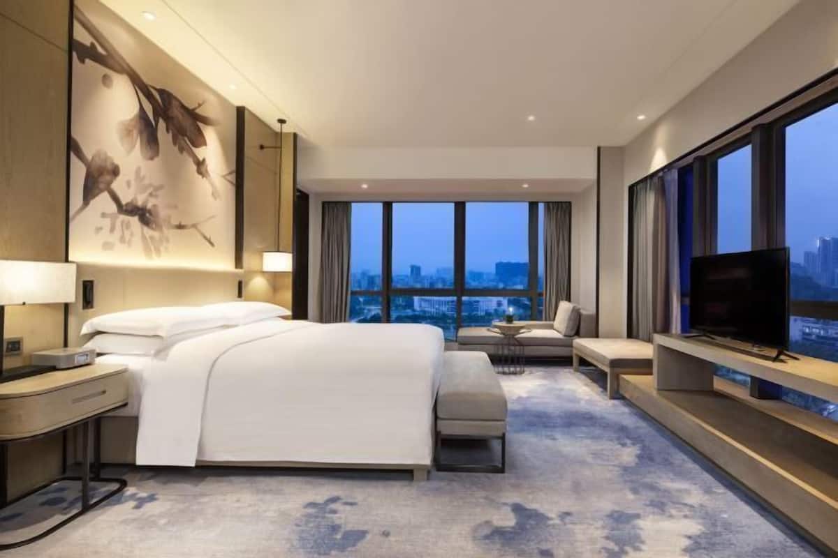 Premium bedding, down comforters, memory foam beds, minibar