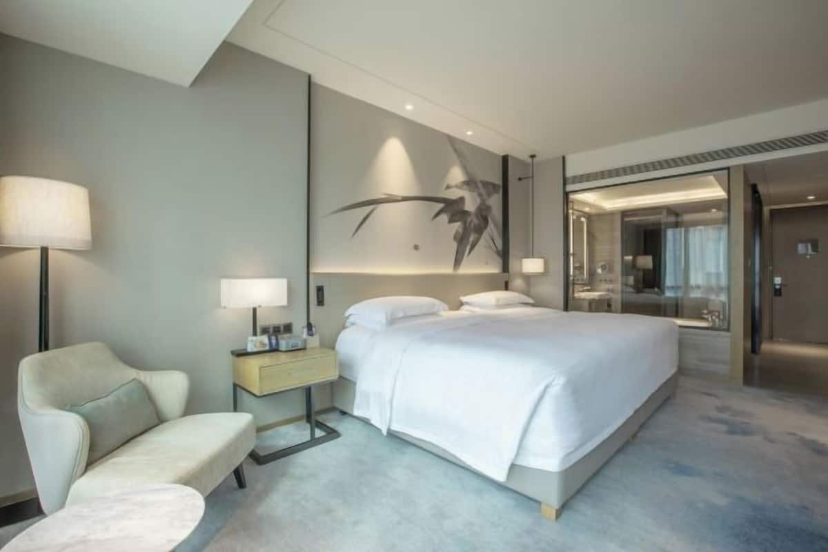 Premium bedding, down comforters, memory foam beds, minibar