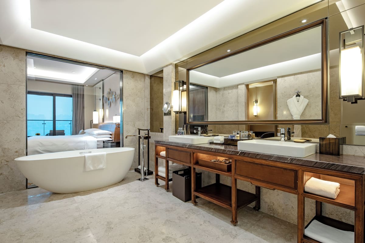 separate bathtub and shower, deep-soaking bathtub, rainfall showerhead