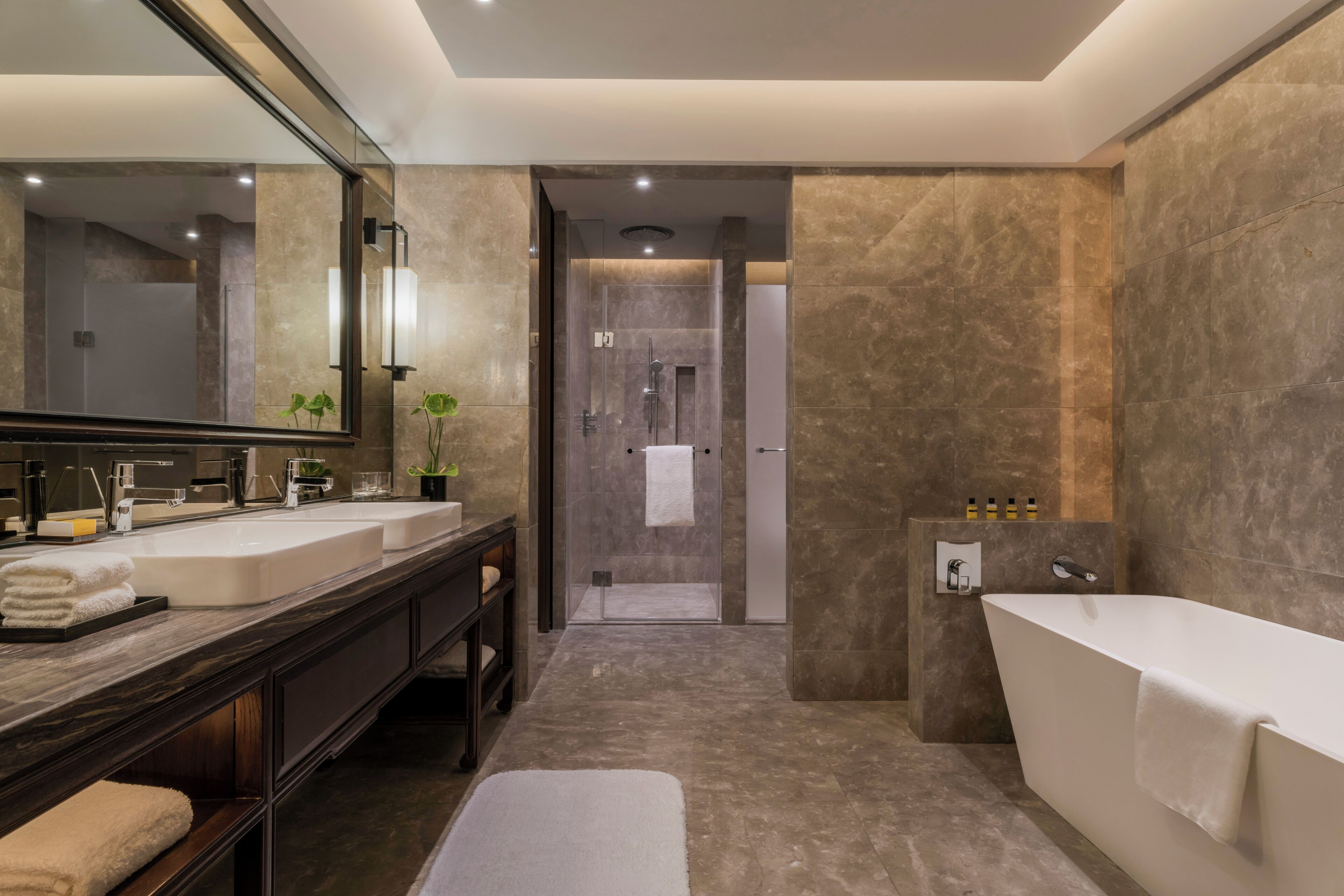 separate bathtub and shower, deep-soaking bathtub, rainfall showerhead