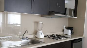 Business Suite, 2 Bedrooms | Private kitchen | Fridge, microwave, stovetop, coffee/tea maker