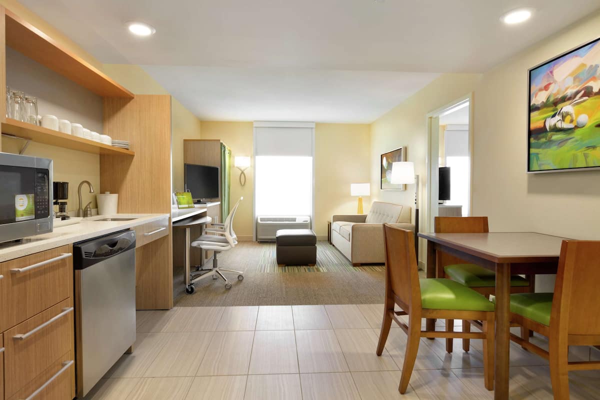 premium bedding, desk, laptop workspace, blackout curtains