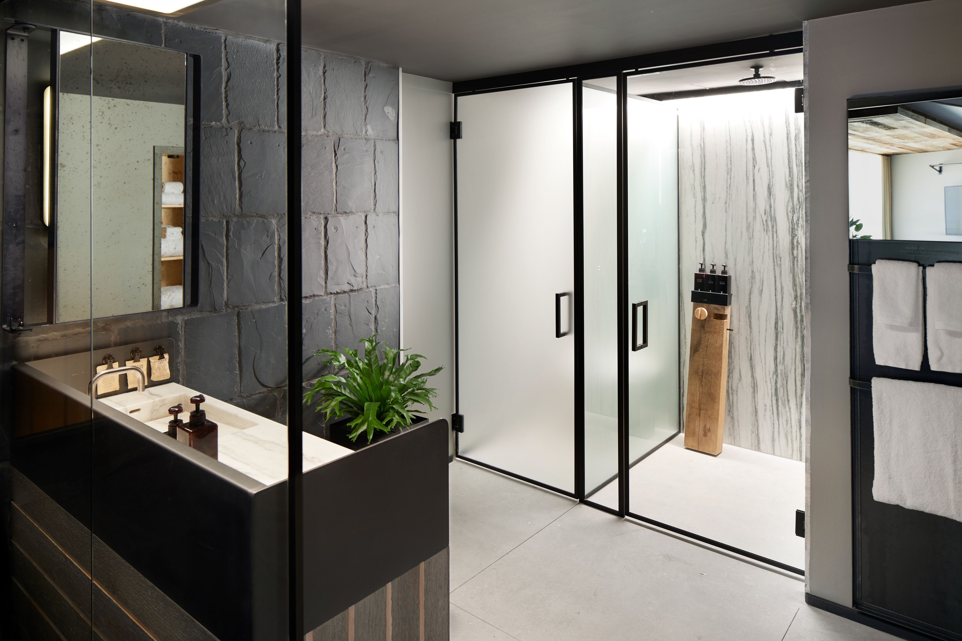 studio suite (statue of liberty) | bathroom | rainfall showerhead, designer toiletries, hair dryer, bathrobes