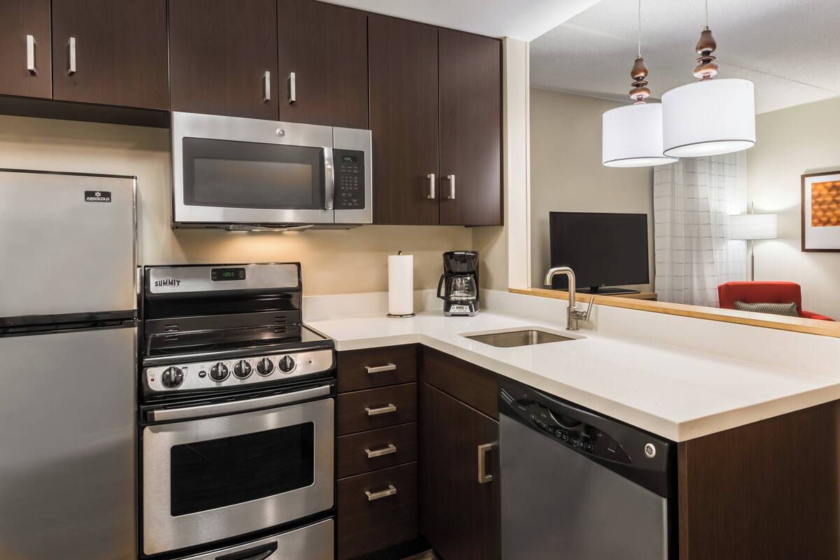 premium bedding, desk, laptop workspace, blackout curtains