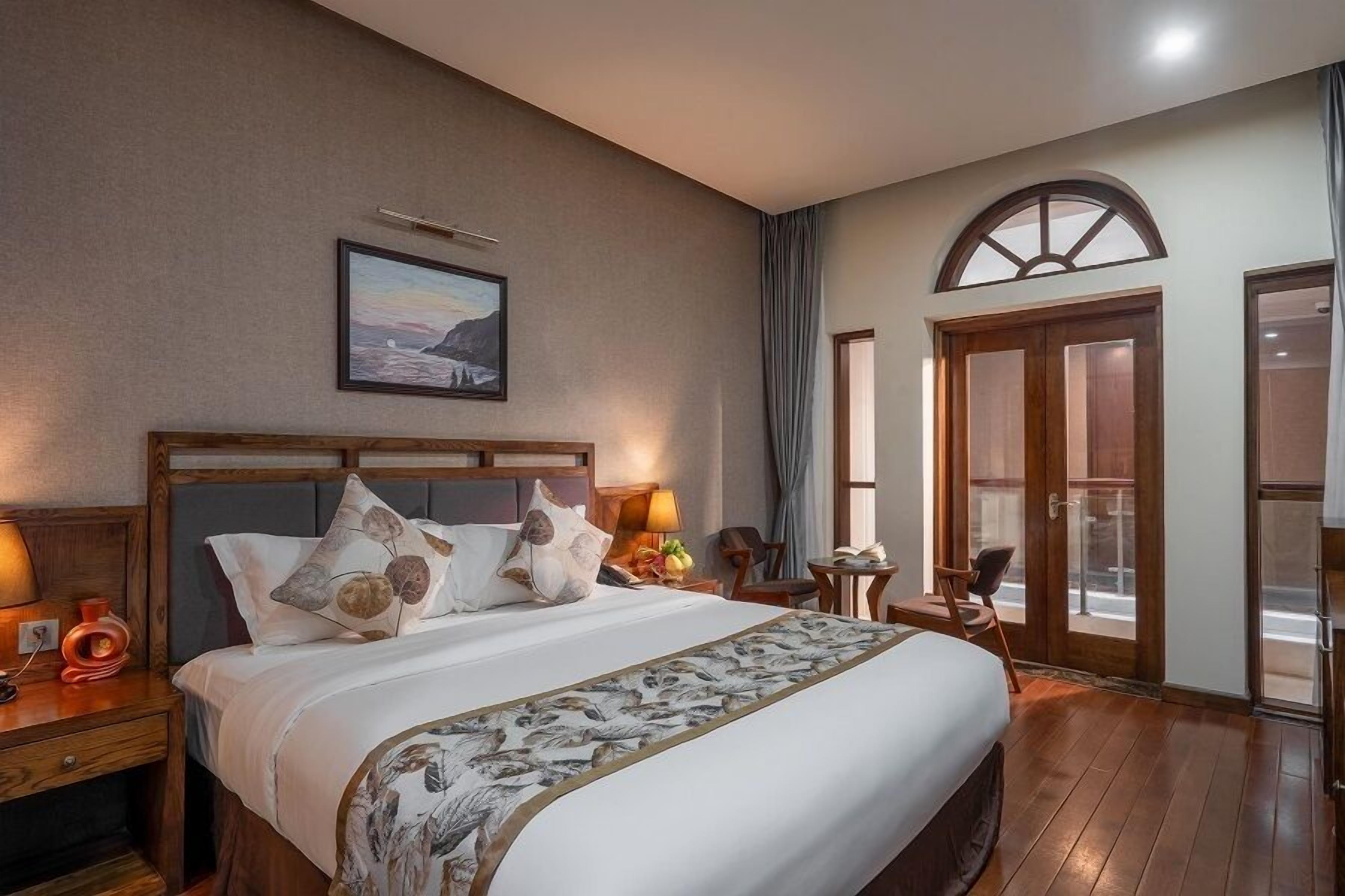 cozy superior room | minibar, in-room safe, desk, iron/ironing board