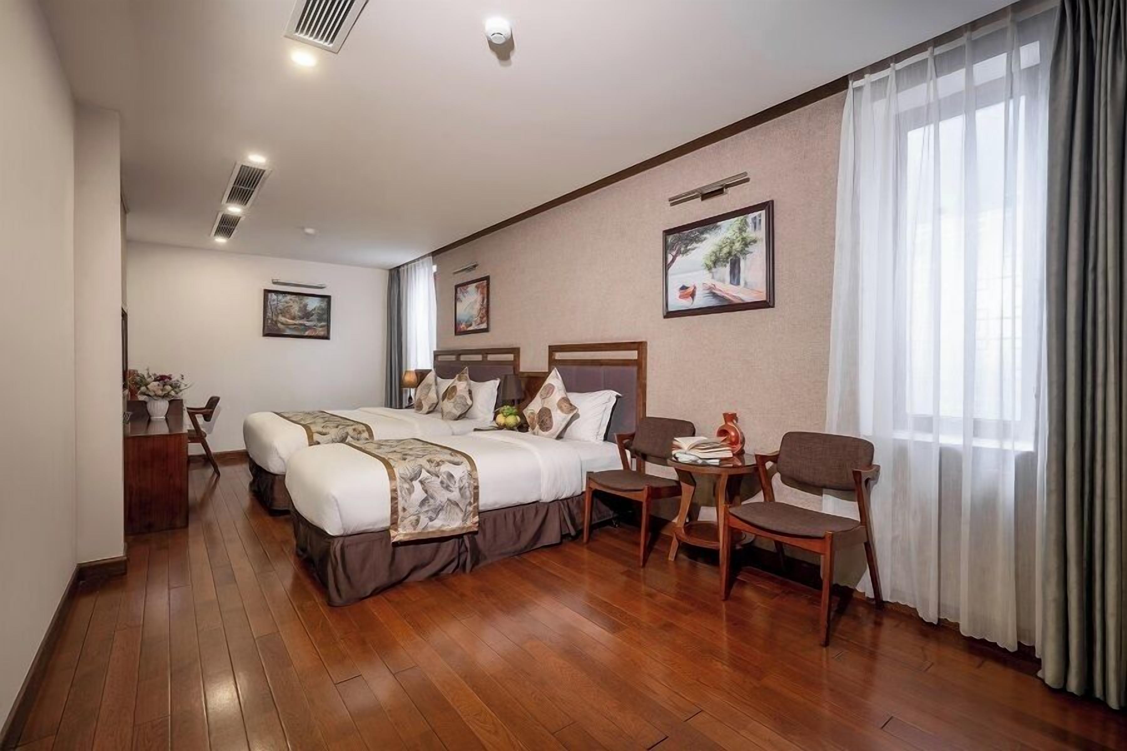 family deluxe room | minibar, in-room safe, desk, iron/ironing board