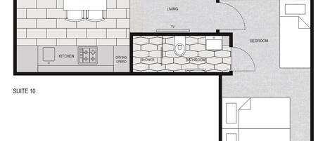 A floor plan of Suite 10 with a kitchen, dining area, living room, bathroom, and bedroom.