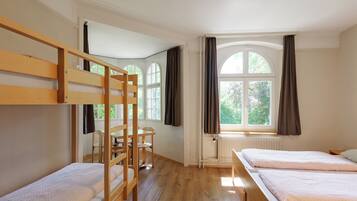 Family Room | Desk, bed sheets