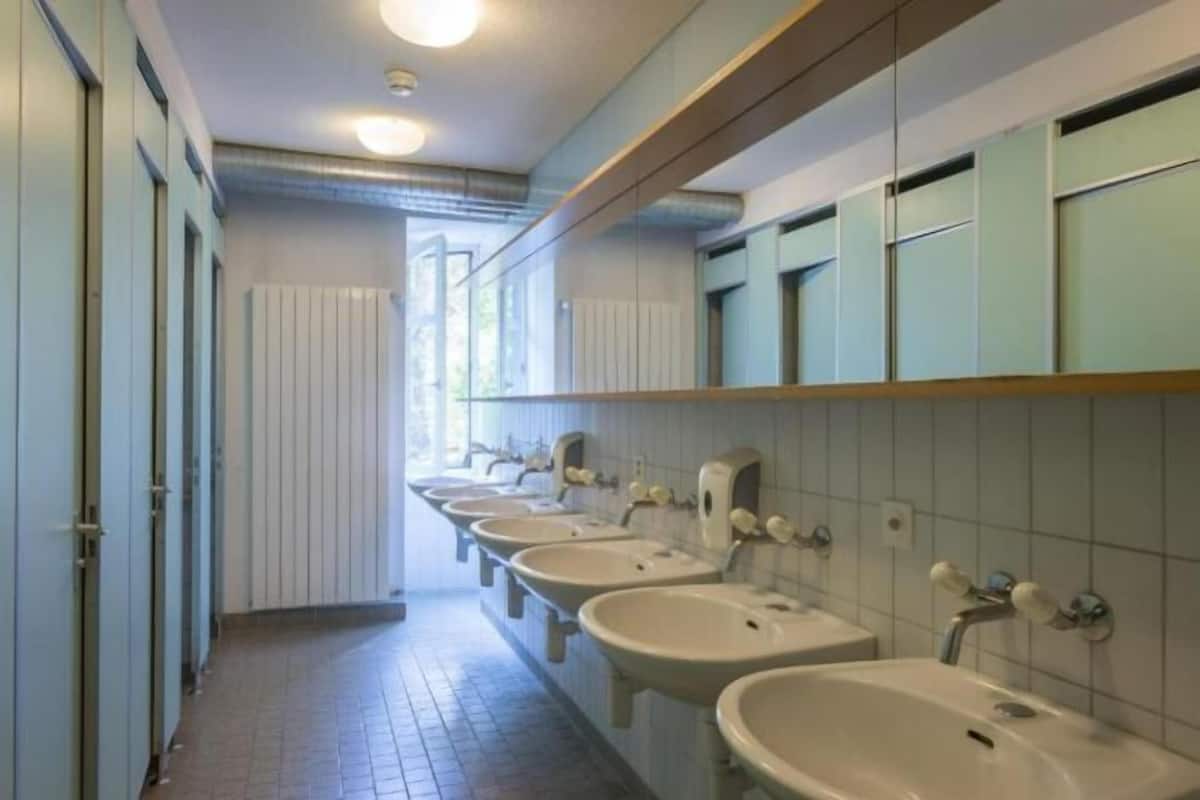 Baño | Regadera y toallas