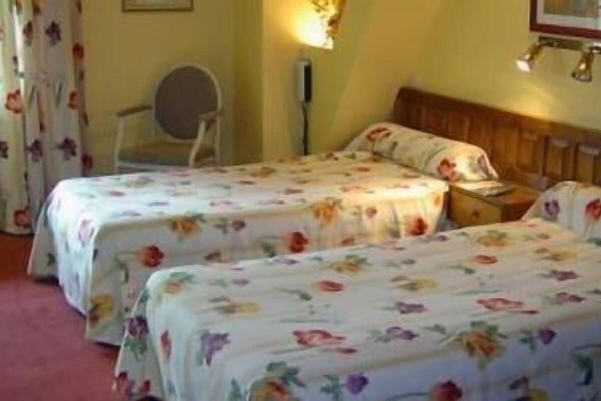 iron/ironing board, cots/infant beds, rollaway beds, free wifi