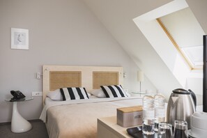 Familie vierpersoonskamer | Hypoallergeen beddengoed, een kluis op de kamer, een bureau