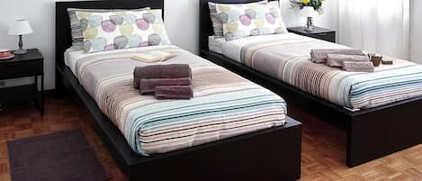 Desk, laptop workspace, free WiFi, bed sheets