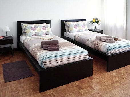 Desk, laptop workspace, free WiFi, bed sheets