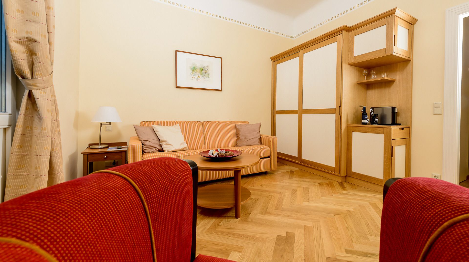 Superior Double Room, Courtyard View | Living area | Flat-screen TV