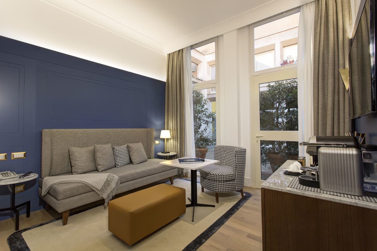 Deluxe Suite (Private Studio) | Living area | LED TV, tablet, iPod dock, MP3 dock