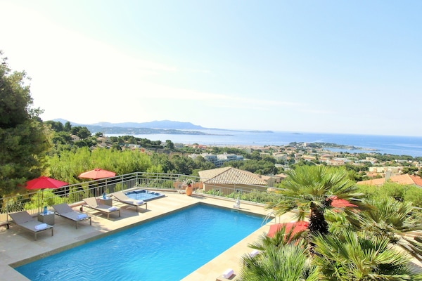 Seasonal outdoor pool, open 8:00 AM to 9:00 PM, pool umbrellas