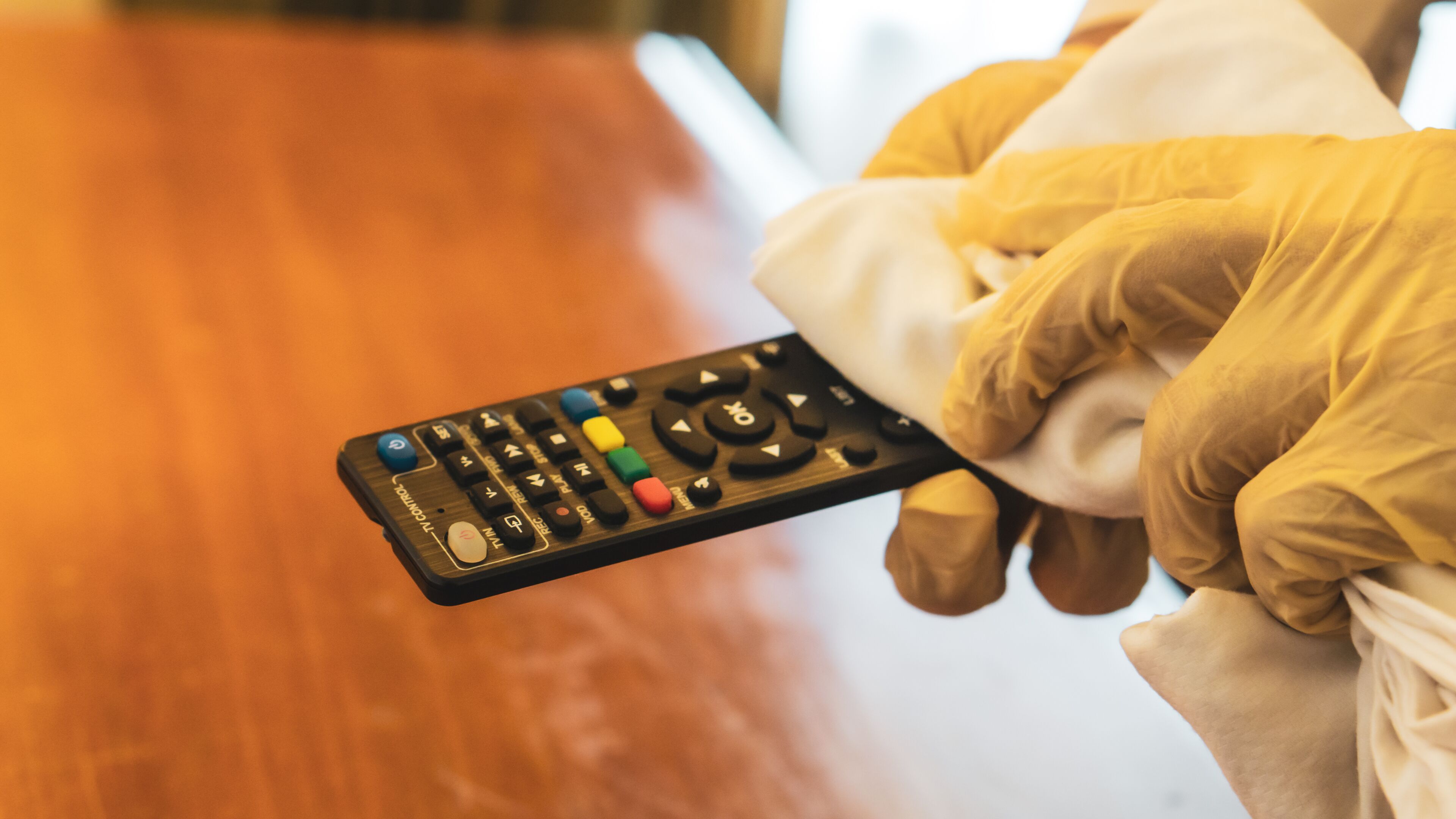 A person holding a remote control.