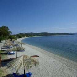 On the beach, sun-loungers, beach umbrellas, beach volleyball