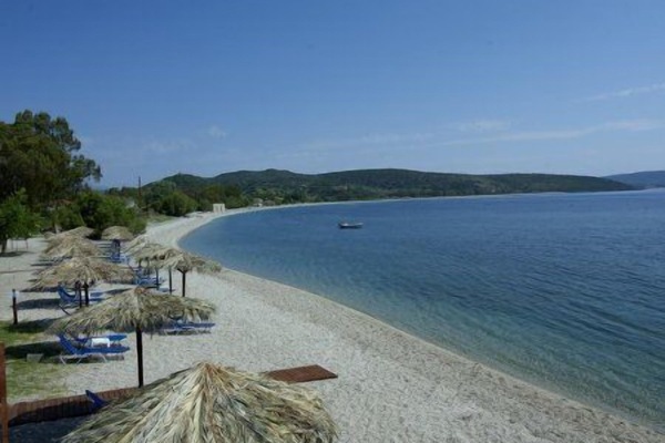On the beach, sun loungers, beach umbrellas, beach volleyball