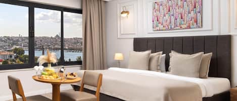 Frette Italian sheets, premium bedding, down duvets, minibar