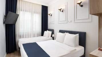Frette Italian sheets, premium bedding, down comforters, minibar
