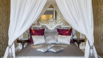 Grand Suite, 2 Bedrooms, Kitchen, Garden Area | 2 bedrooms, minibar, in-room safe, desk