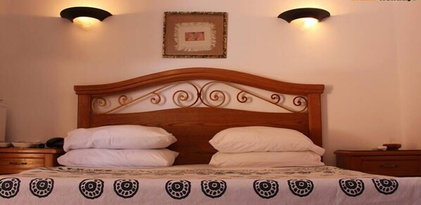 Minibar, in-room safe, blackout curtains, cots/infant beds