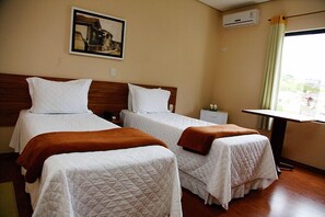 Twin Room, 2 Single Beds | Minibar, blackout curtains, free cots/infant beds, rollaway beds