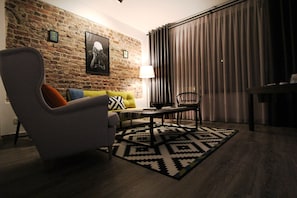 Elite appartement, 1 slaapkamer | Woonruimte | Flatscreentelevisie