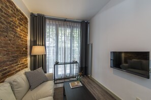 Standard Apartment | Living room | Flat-screen TV