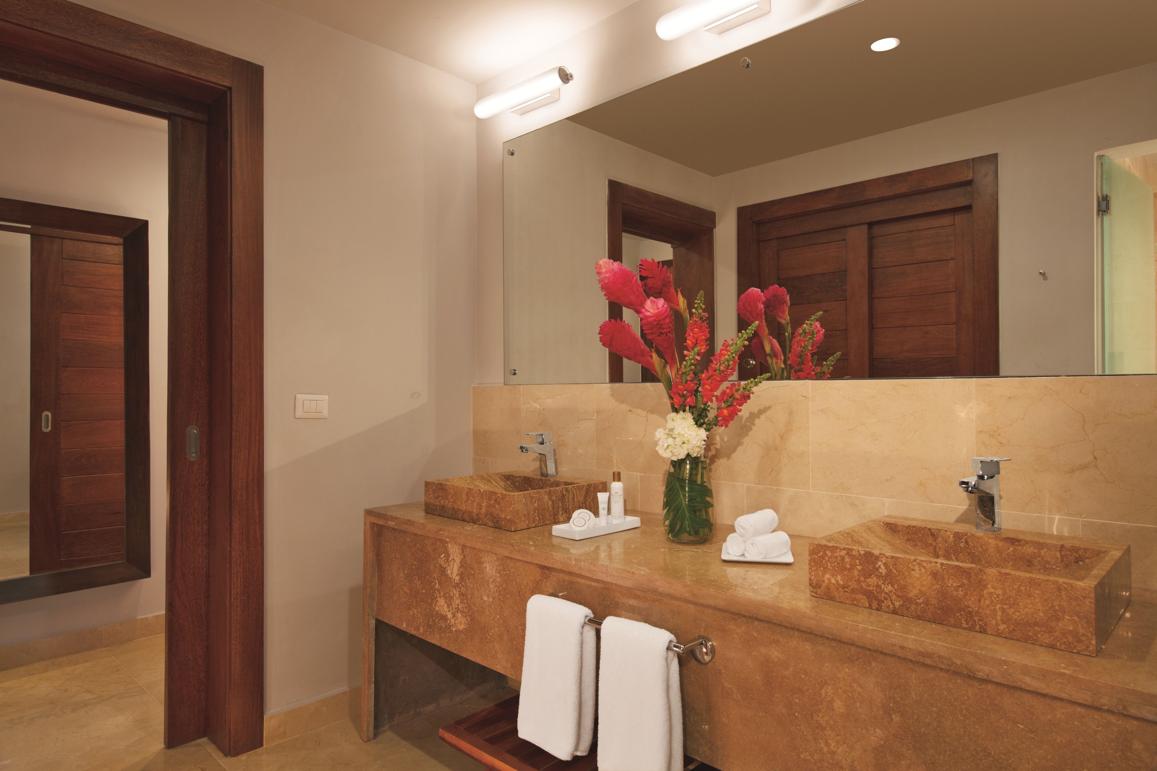 preferred club honeymoon suite | bathroom | shower, rainfall showerhead, hair dryer, towels