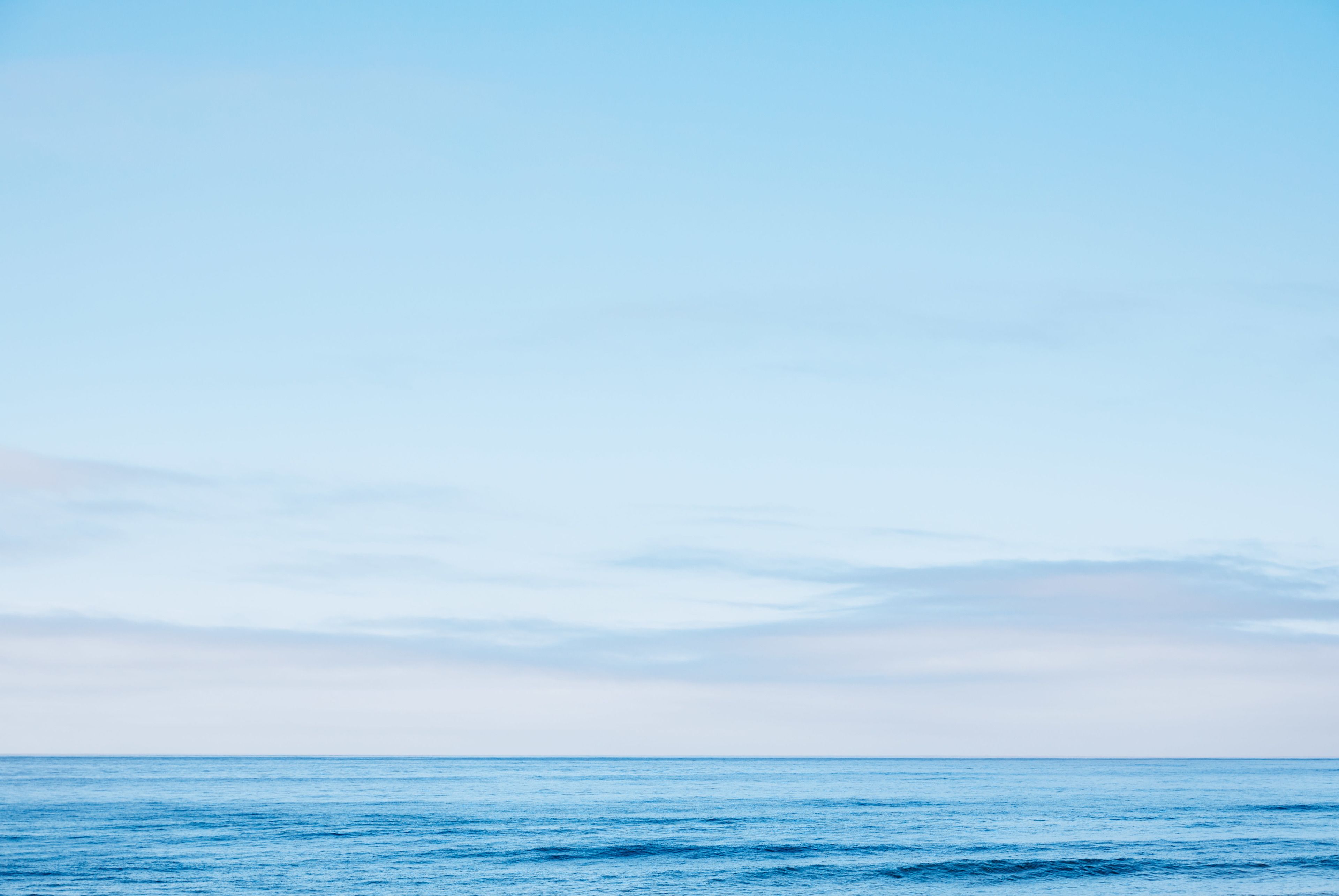 on the beach, sun-loungers, beach umbrellas, beach towels