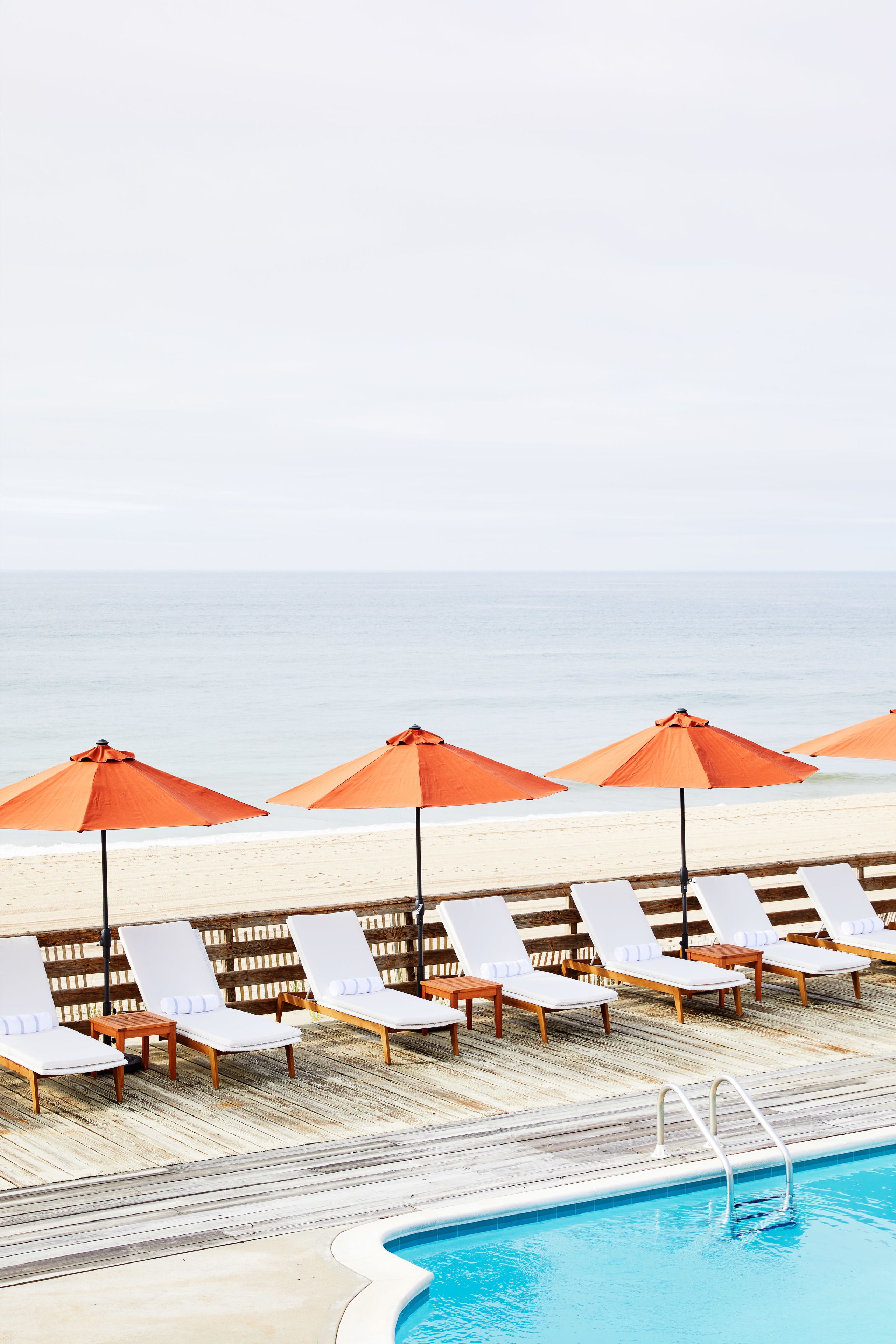 Seasonal outdoor pool, pool umbrellas, pool loungers