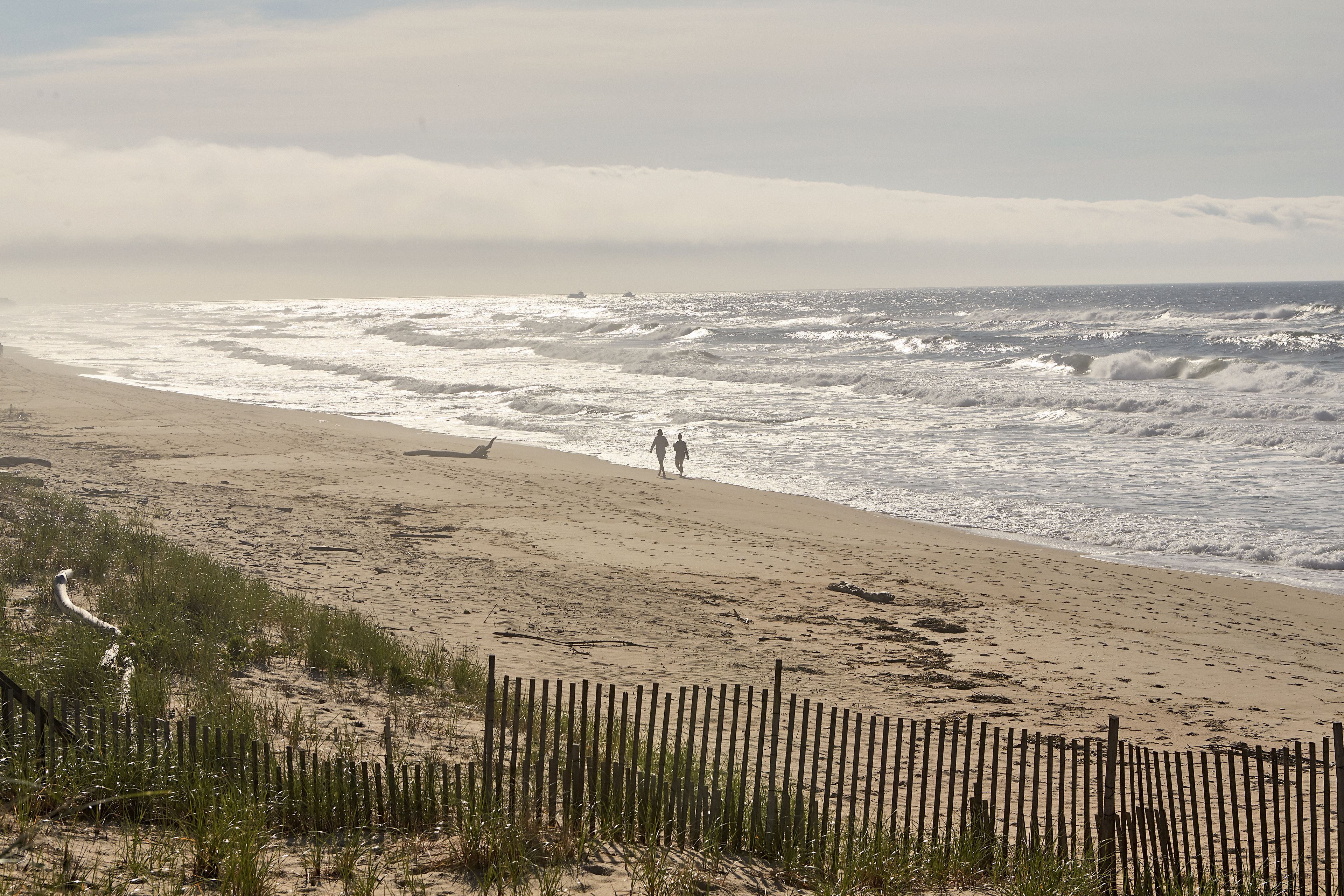 On the beach, sun-loungers, beach umbrellas, beach towels