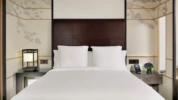 Premium bedding, down duvets, minibar, in-room safe