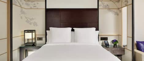 Premium bedding, down comforters, minibar, in-room safe