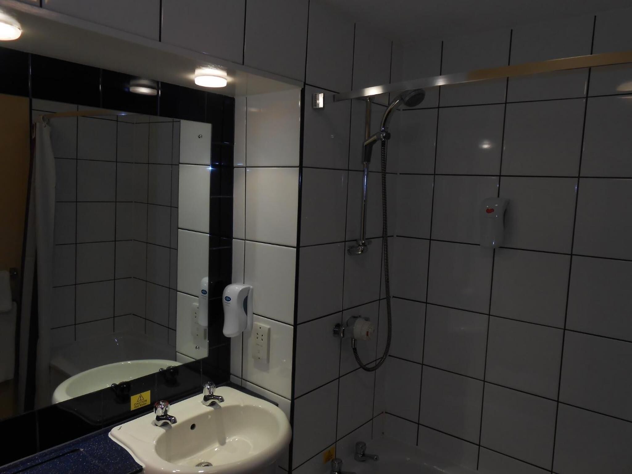 combined shower/bathtub, free toiletries, hair dryer, towels