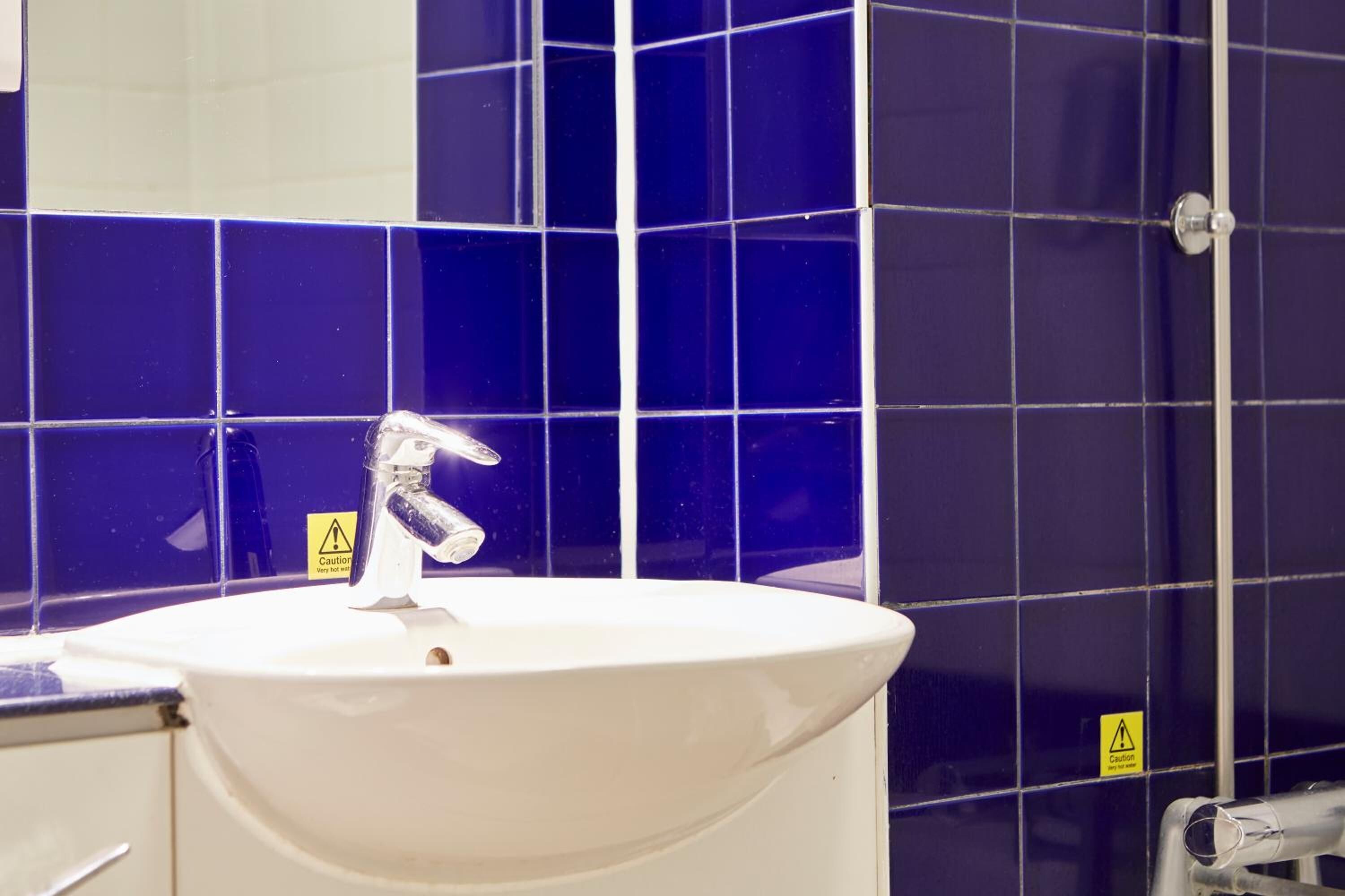 combined shower/bathtub, free toiletries, hair dryer, towels